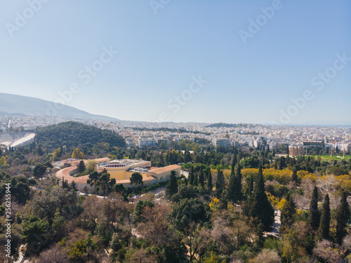 City views of day time with acropolis on a hill at the horizon, Athens, Greece