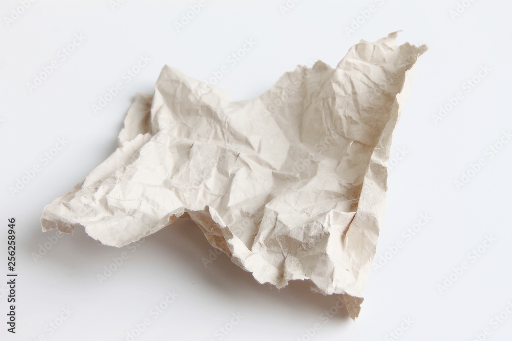 piece of crumpled paper on white background piece of crumpled paper on white background