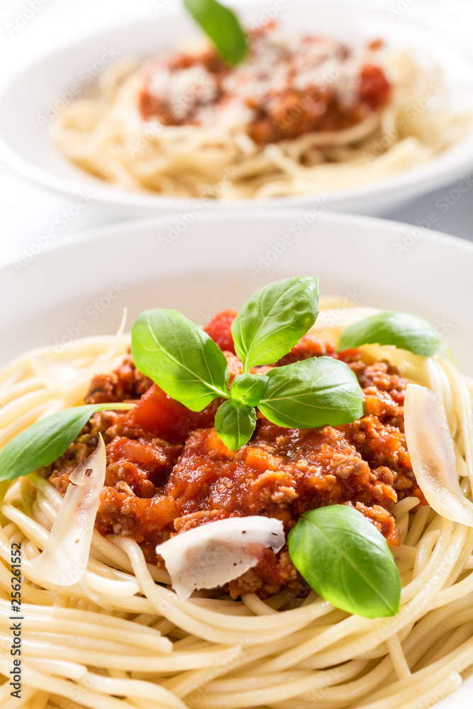 Spaghetti Bolognese with cheese and basil Spaghetti Bolognese with cheese and basil
