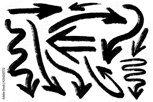 Vector hand drawn design elements. Ink brush drawn arrows various shapes. Monochrome collection.