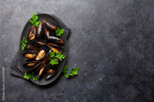 Delicious mussels with tomato sauce and parsley