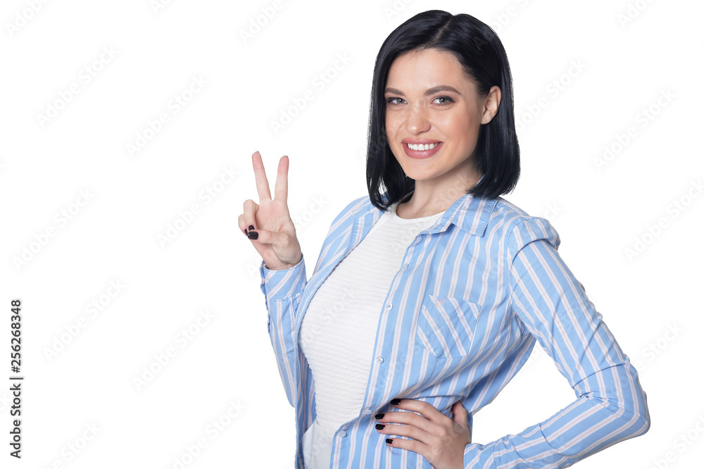 Portrait of beautiful young woman showing peace Portrait of beautiful young woman showing peace