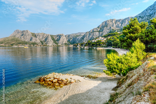 Fototapeta Naklejka Na Ścianę i Meble -  Coastal town of Omis surrounded with mountains in Croatia, Adriatic sea