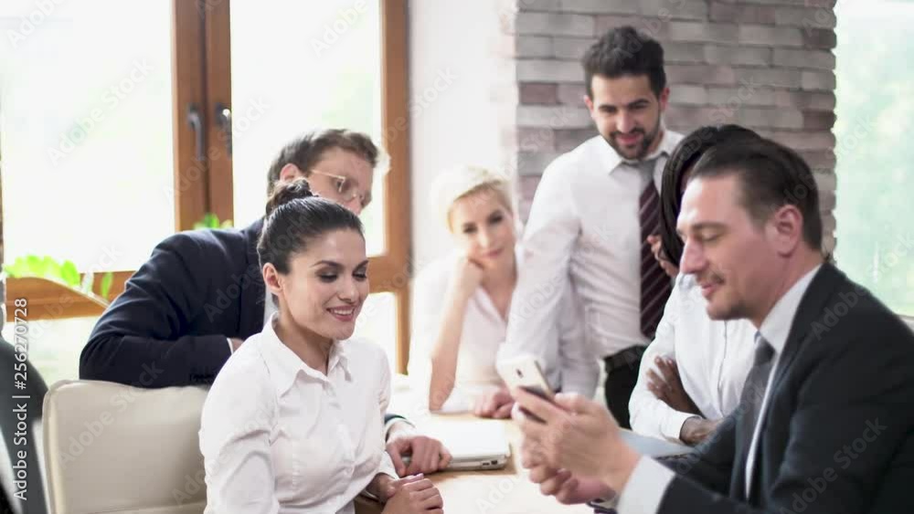Business colleagues take group selfie at meeting Business colleagues take group selfie at meeting