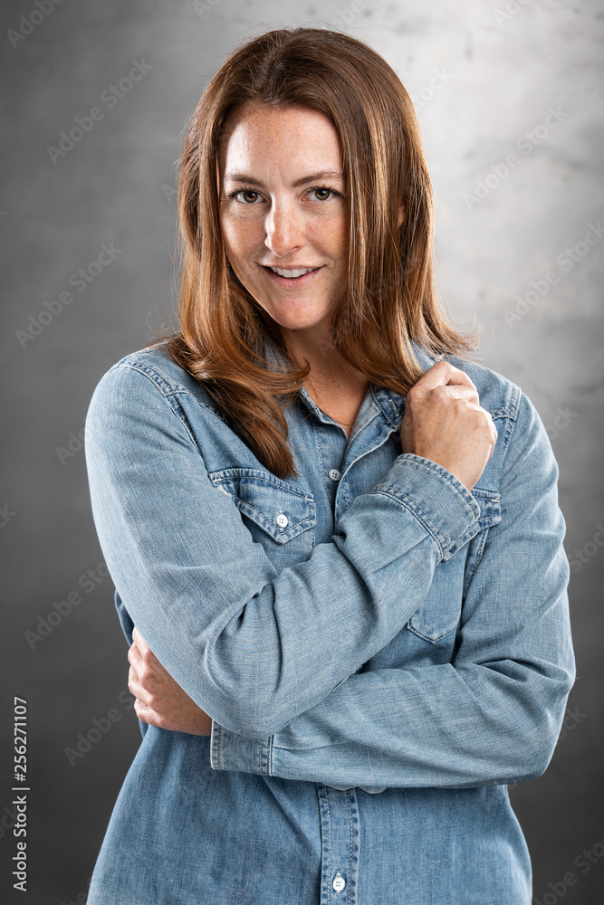 Portrait of pretty woman with red hair and freckles Portrait of pretty woman with red hair and freckles