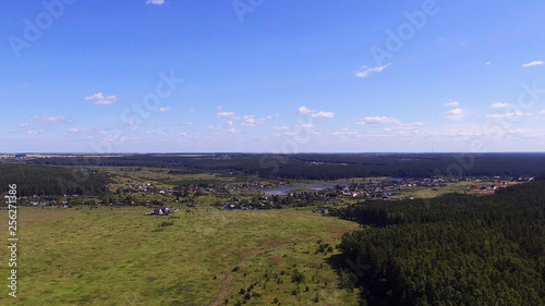 Obraz na płótnie Landscape and a small village on the river from a height w salonie