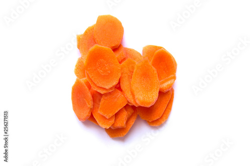 Obraz na płótnie Fresh carrot sliced into thin slices on a white background w salonie