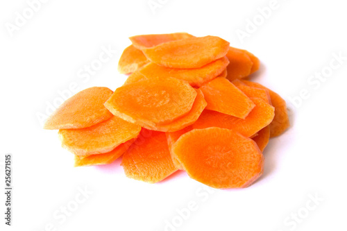 Obraz na płótnie Fresh carrot sliced into thin slices on a white background w salonie