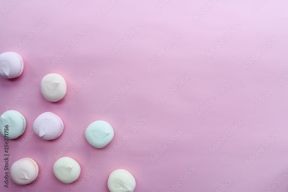 marshmallow in pastel colors on pink background with copy space. marshmallow in pastel colors on pink background with copy space.
