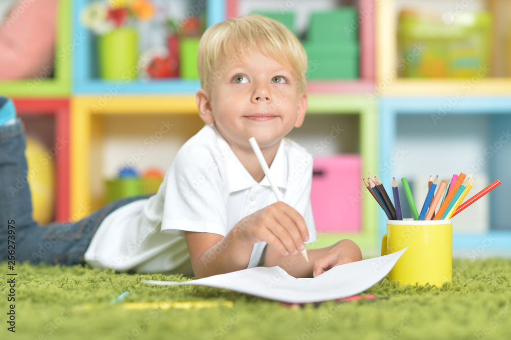 Portrait of little boy drawing with pencils Portrait of little boy drawing with pencils