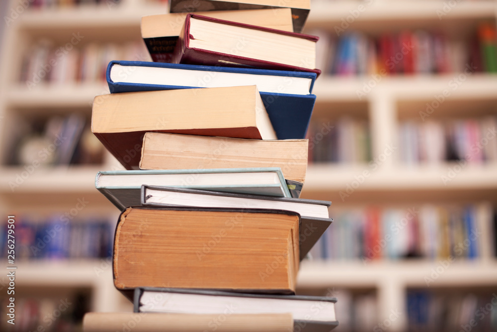 Stack books on library background Stack books on library background
