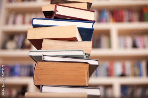 Stack books on library background