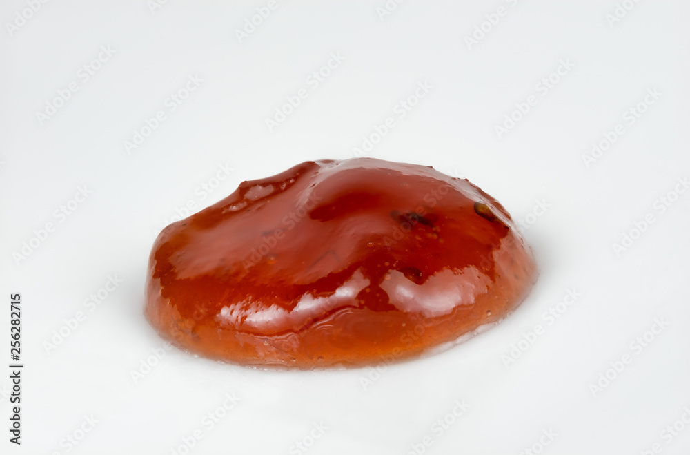 Macro image of a blob of strawberry jam Macro image of a blob of strawberry jam