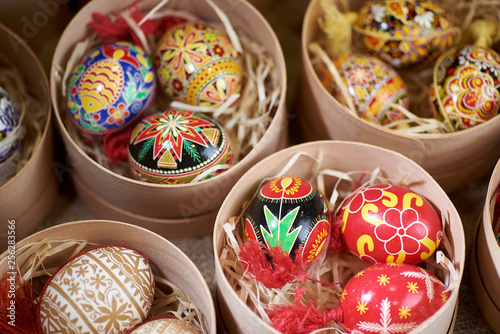 Easter painted eggs - traditional Ukrainian souvenir, in straw