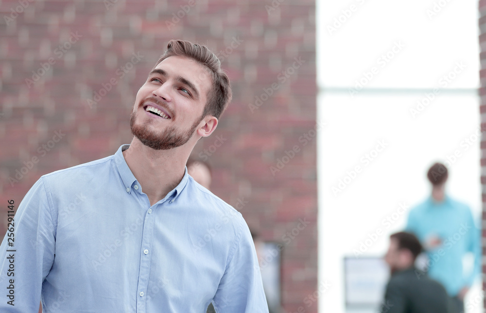 Obraz premium Portrait of smiling businessman in office.