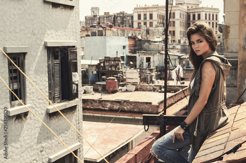 Woman on the roof of old building in Havana