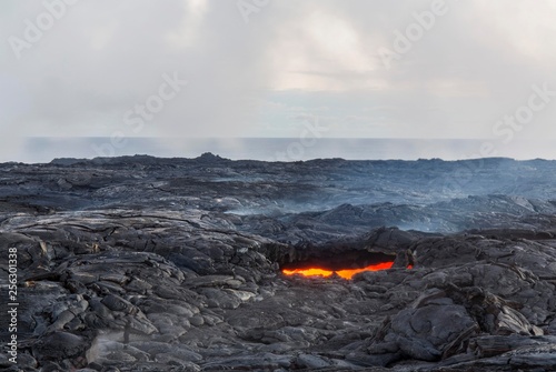 Lava hole, Kamokuna, Kilauea Volcano, Hawai'i Volcanoes National Park, Big Island, Hawai'i, USA, North America photo