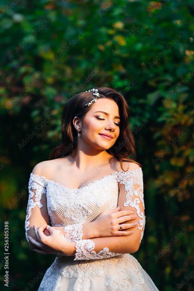 portrait of a beautiful bride posing in her wedding day. beautif portrait of a beautiful bride posing in her wedding day. beautif