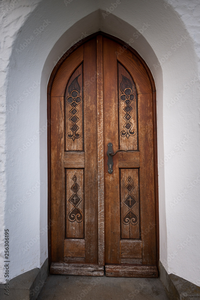 Door of a small chapel on a hill near Weißensberg