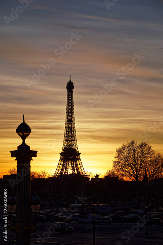 Paris, France - February 13, 2019: Eiffel tower at sunset viewed from Tuileries garden