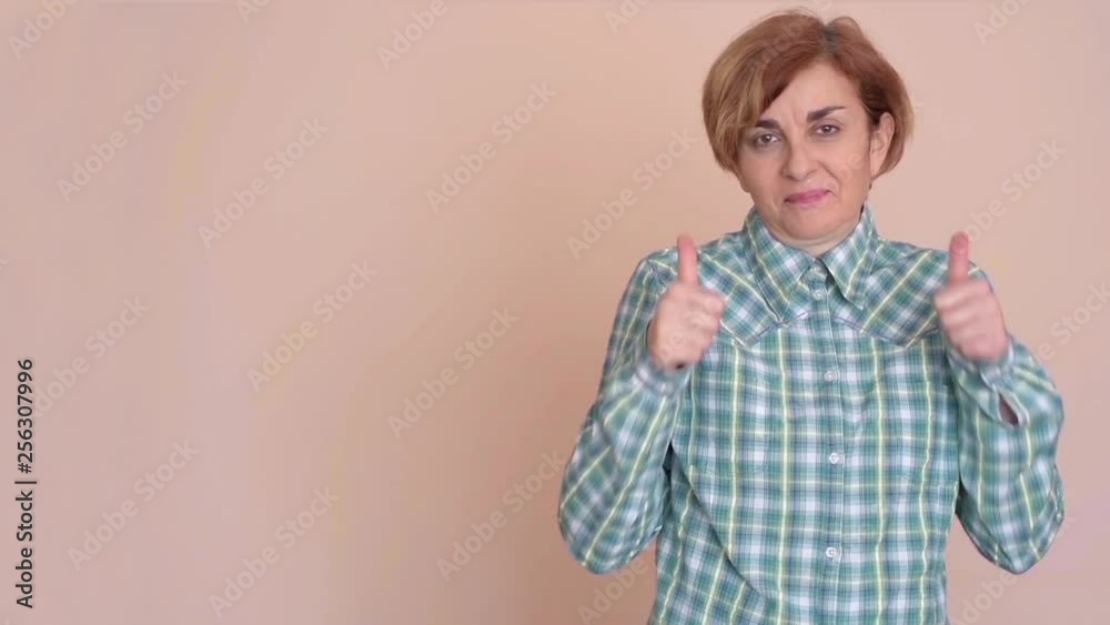 Woman hitting and breaking words sexual abuse with her fist Woman hitting and breaking words sexual abuse with her fist