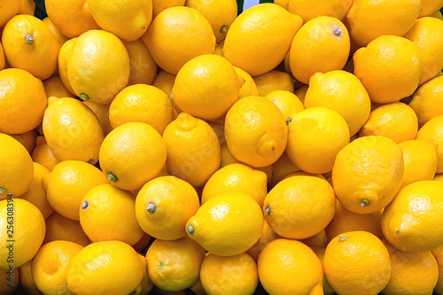 A pile of lemons as a background (texture)