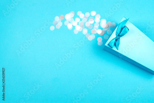Blue box with pastel confetti.