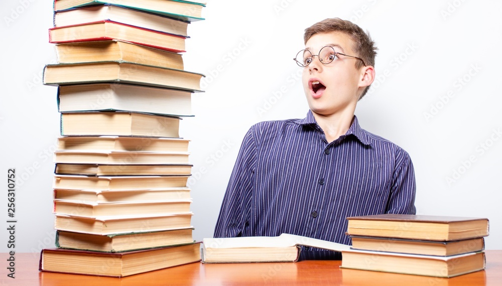 Boy reading book, education concept and school, person. Boy reading book, education concept and school, person.