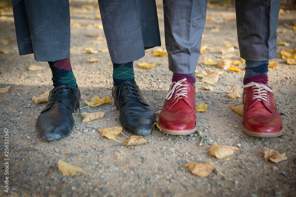 Shoes of two old-fashioned elegant men standing side by side Shoes of two old-fashioned elegant men standing side by side