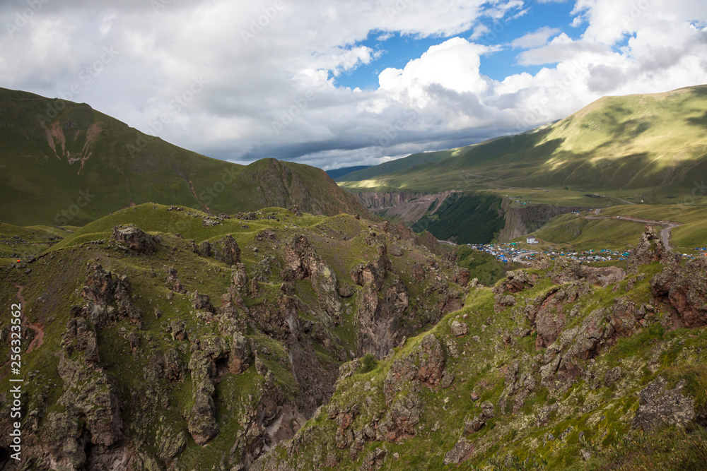 Fototapeta premium Mountains of the North Caucasus, mountain tops in clouds. Wild nature