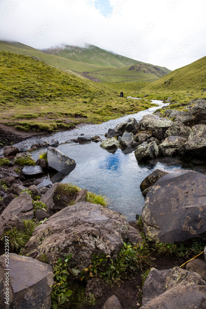 The mountain river in the beautiful gorge. The wild nature in mountains of the North Caucasus