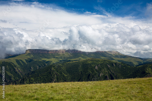 Mountains of the North Caucasus  mountain tops in clouds. Wild nature