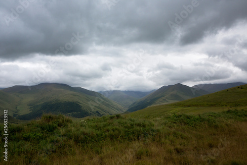 Mountains of the North Caucasus, mountain tops in clouds. Wild nature