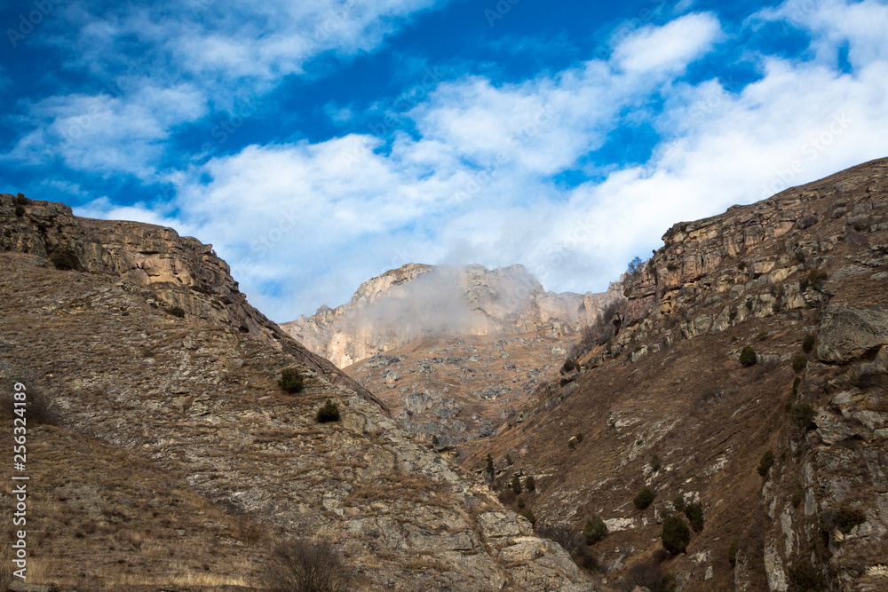 Mountains of the North Caucasus, mountain tops in clouds. Wild nature Mountains of the North Caucasus, mountain tops in clouds. Wild nature