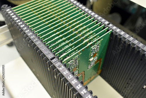 Close-up of circuit boards in an electronics factory photo