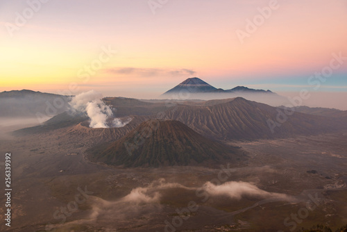 Spectacular view of Mount Bromo at dawn. This is an active volcano part of the Tengger massif, in East Java, Indonesia. Beautiful pastel sky in the morning.