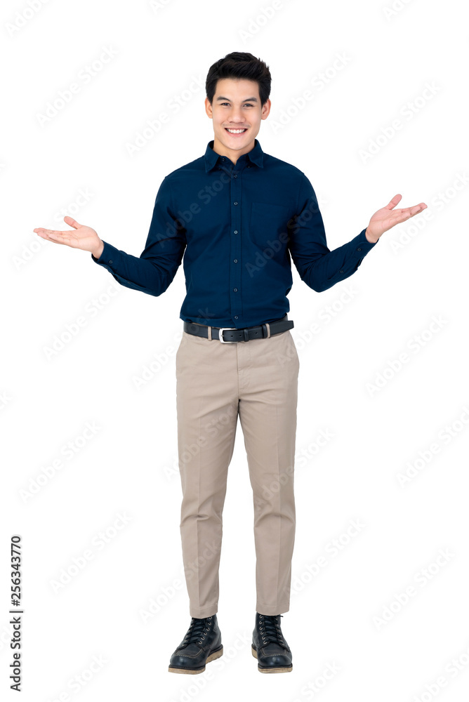 Young smiling handsome Asian man with open palms gesture Young smiling handsome Asian man with open palms gesture
