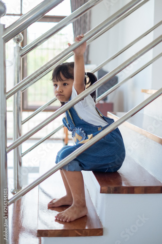 woman sitting on stairs