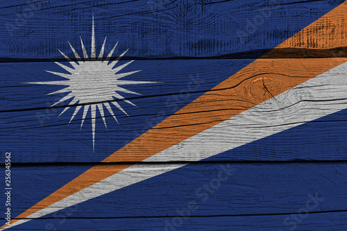 Marshall Islands flag painted on old wood plank