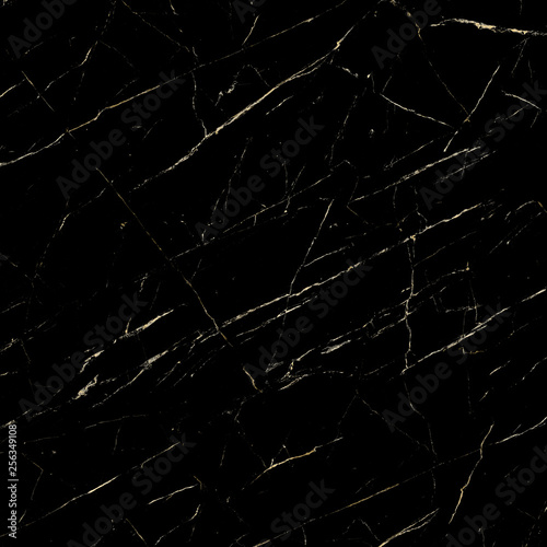 natural dark granite with golden texture © Rajendra Ghodasara