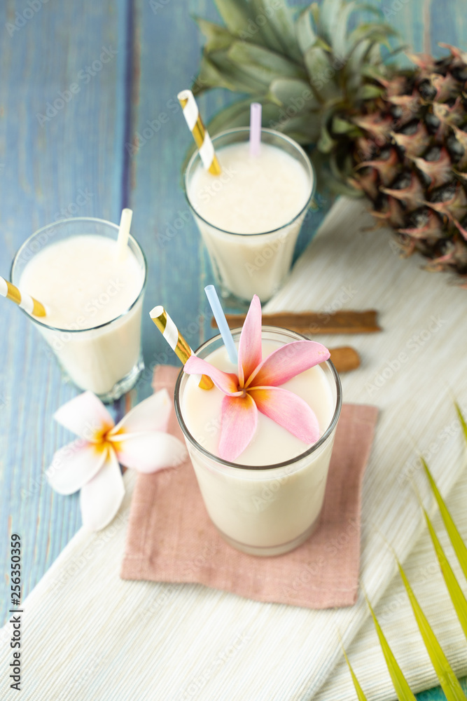 White Milk Yogurt Beverage On A Tropical Background