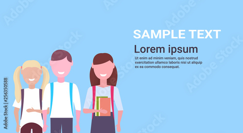 pupils with backpack holding books schoolboy and schoolgirls standing together education knowledge concept male female characters portrait blue background copy space horizontal