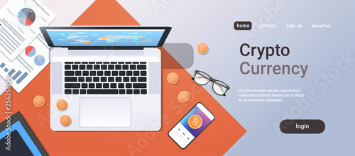 crypto currency block chain concept bitcoin mining top angle view desktop laptop smartphone paper documents financial report office stuff horizontal copy space