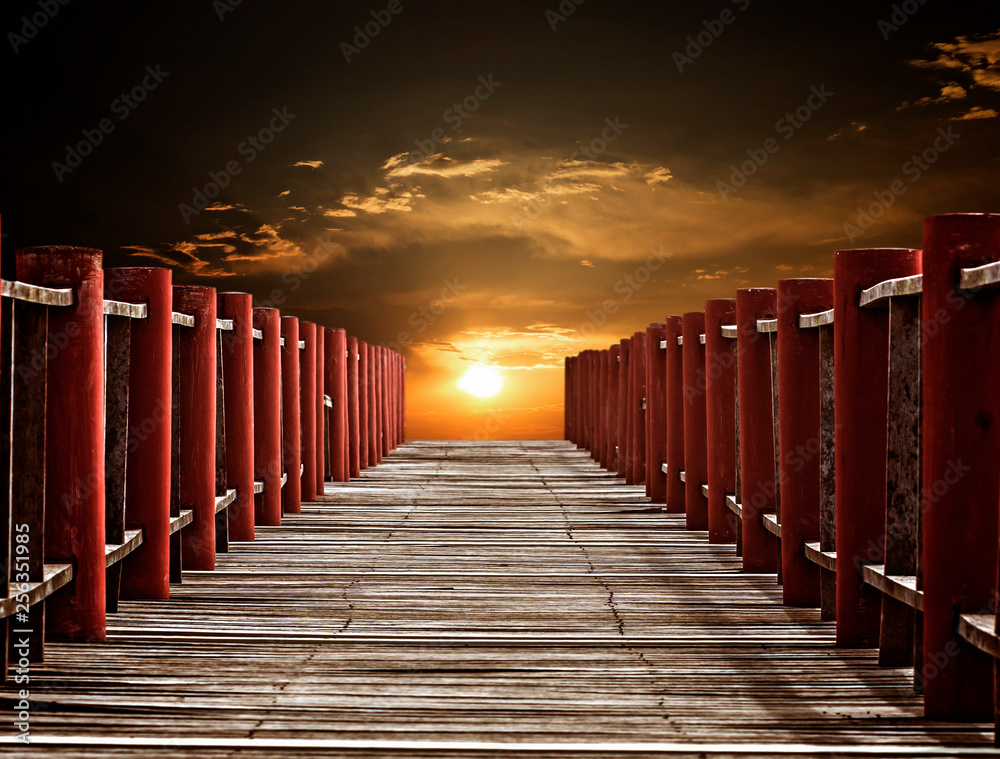 Wooden bridge and sun