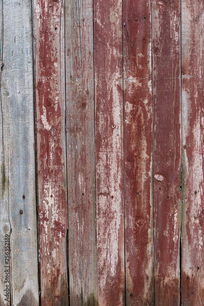 Wooden texture with old peeling paint red Wooden texture with old peeling paint red