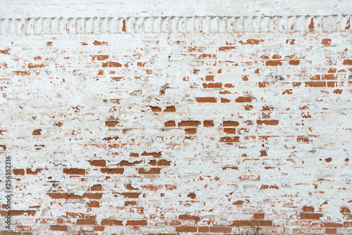 Obraz na płótnie The texture of the old brick wall painted white with peeling paint w salonie