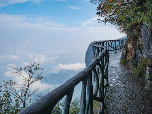 Walkway balcony on the Tianmen mountain cilff with beautiful White cloud and sky at zhangjiajie city China.Tianmen mountain the travel destination of Hunan zhangjiajie city China