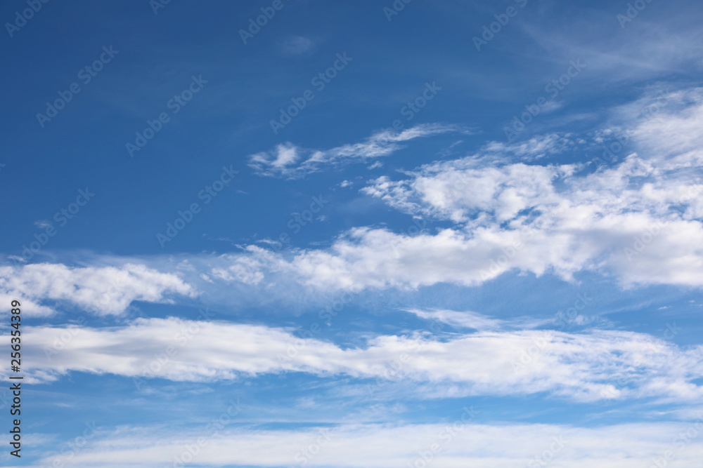 background of blue sky and more clouds