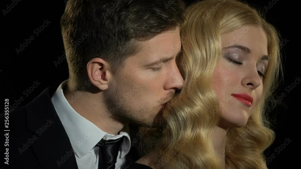 Handsome man inhaling scent of beloved woman, enjoying intimate moment, flirt Handsome man inhaling scent of beloved woman, enjoying intimate moment, flirt
