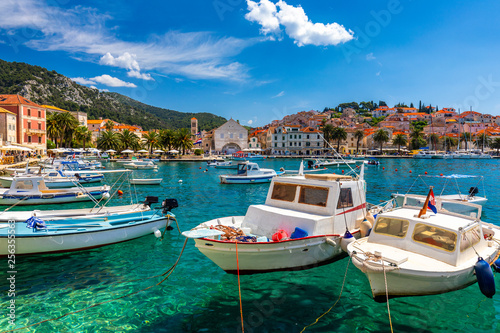View at amazing archipelago with boats in front of town Hvar, Croatia. Harbor of old Adriatic island town Hvar. Popular touristic destination of Croatia. Amazing Hvar city on Hvar island, Croatia. photo